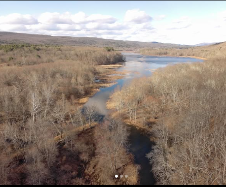 Neversink and Basha Kill watershed field view with sky and ridgeline